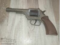 Old children's pistol with grips