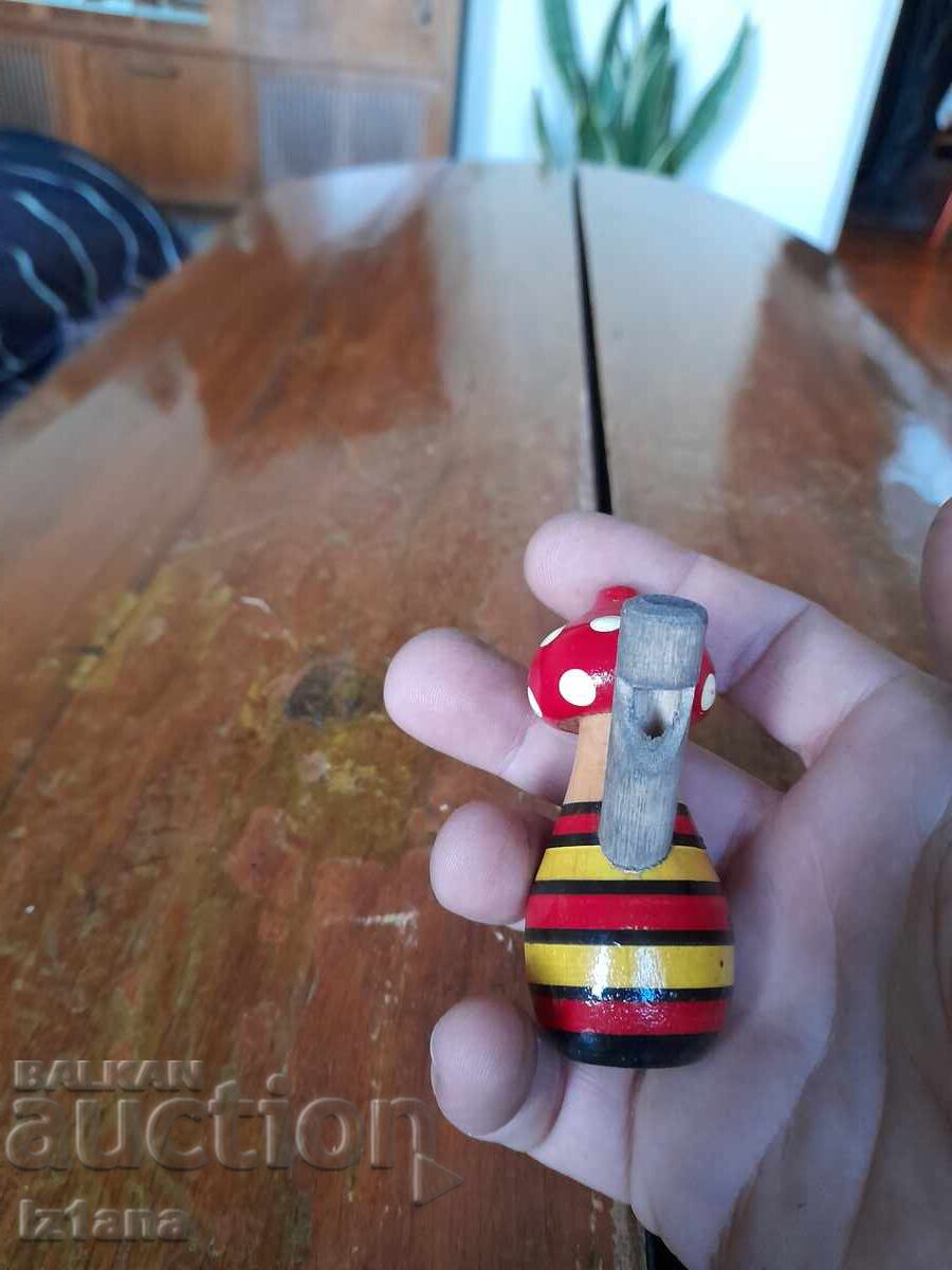 Delivery of An old children's whistle Delivery of An old children's whistle