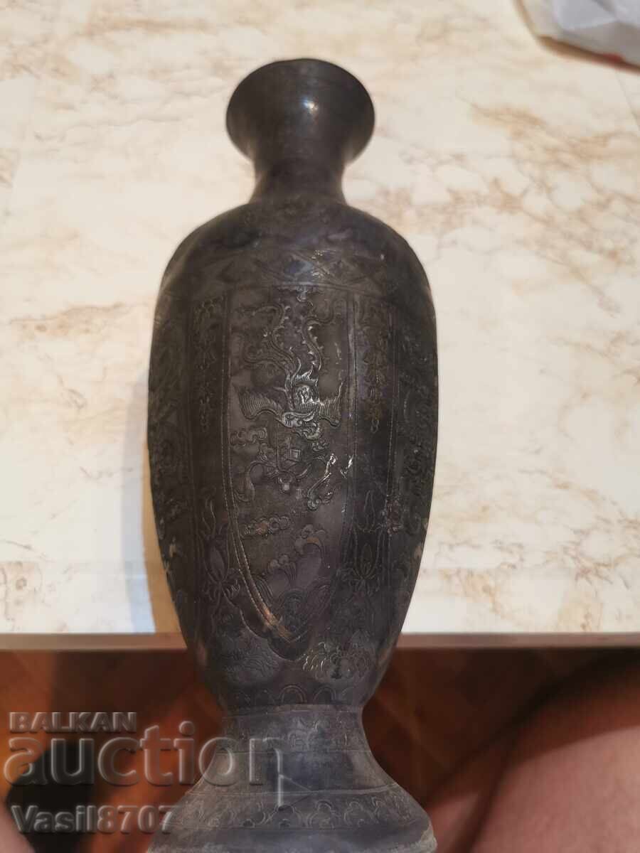 Old hand-carved vase