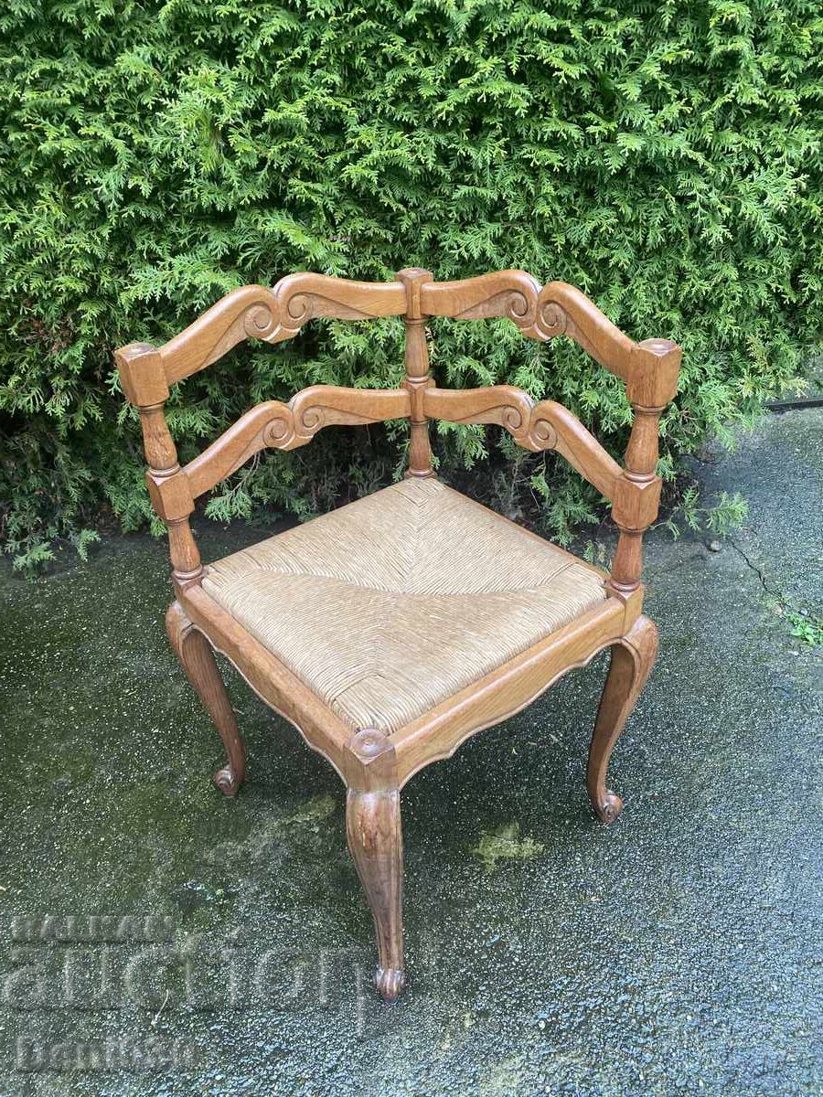 Antique oak corner chair with beautiful carvings