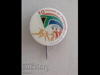 Badge: South Africa-1994-2004-10 Years of Freedom