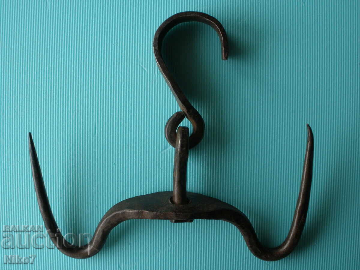 Auction  Antique, large, massive, hand-forged double-clasp hook.