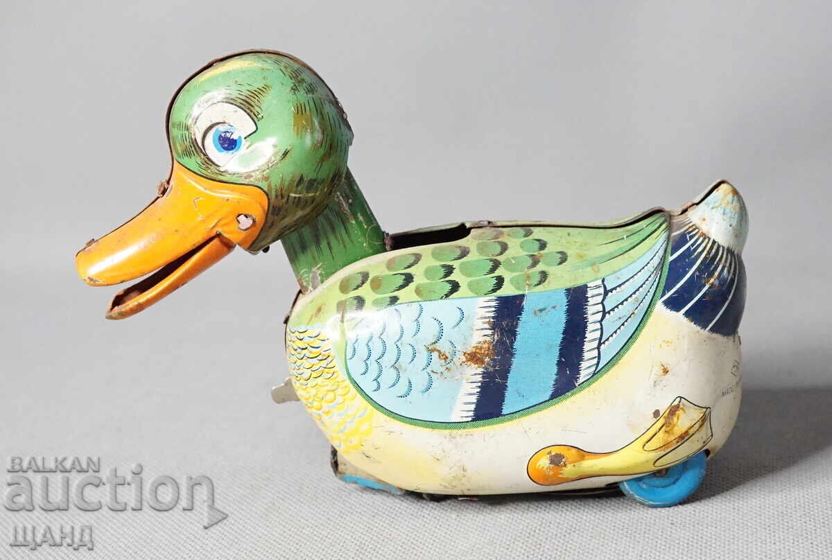 Old Japanese metal mechanical duck toy