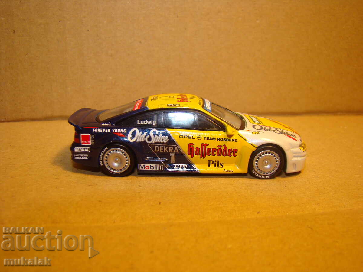 1/64 MICROCHAMPS OPEL CALIBRA RALLY MODEL DE JUCĂRIE