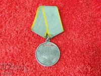 Old silver medal with number USSR FOR COMBAT MERITS