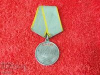 Old silver medal with number USSR FOR COMBAT MERITS