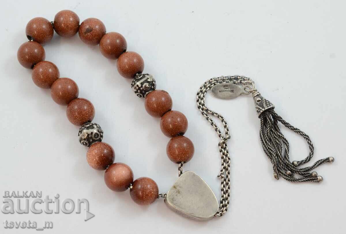 Δημοπρασία Ροζάριο, ασημί και καφέ πέτρα