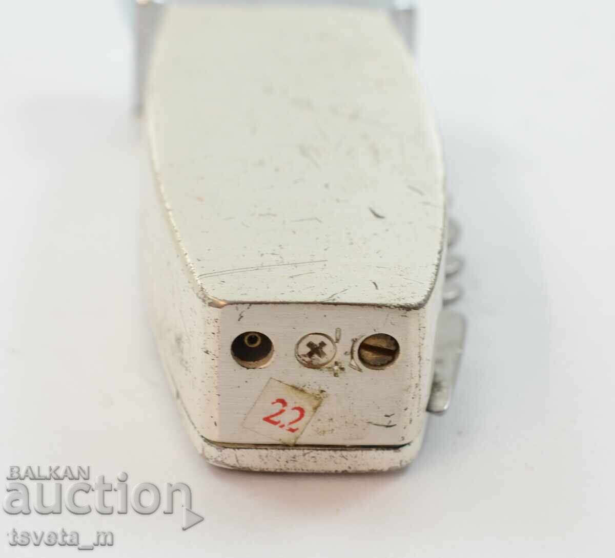 Auction  Gas lighter with pocket knife