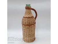 Glass demijohn with wicker braid (11.1)