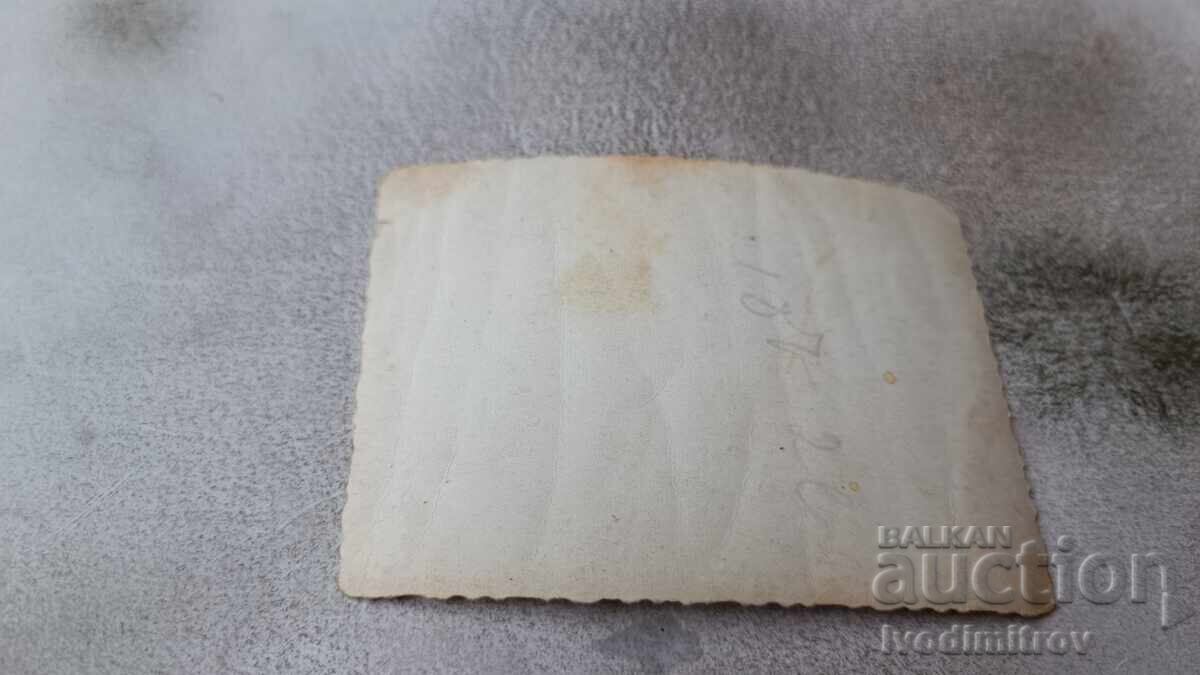 Photo Young girl sitting on the grass with price 1.65 BGN | € 0.84