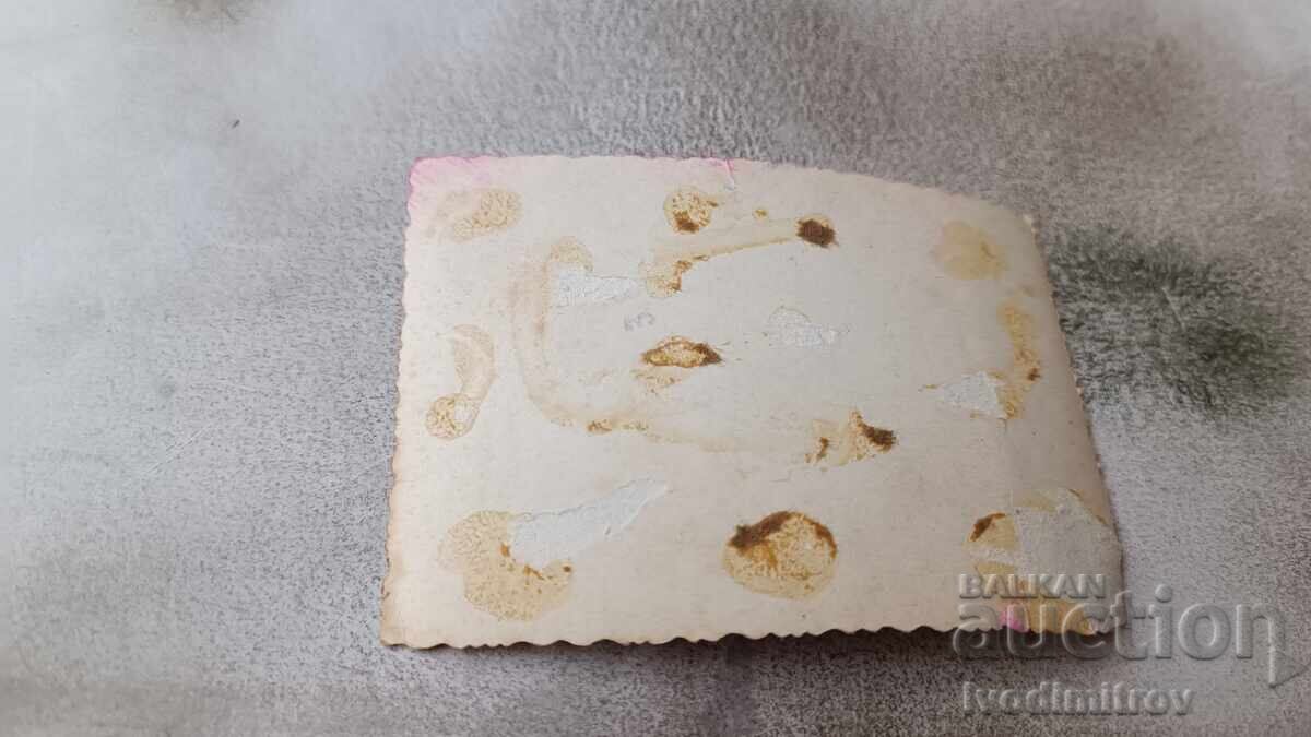 Photo: Girls sitting on chairs on the sidewalk in front of a house with price 1.65 BGN | € 0.84 Photo: Girls sitting on chairs on the sidewalk in front of a house with price 1.65 BGN | € 0.84