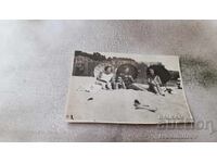 Photo Four young girls on the beach