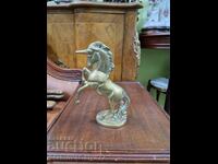 A beautiful antique collectible English bronze figurine