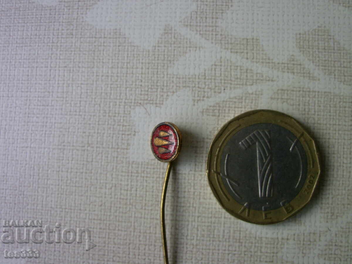 Delivery of TABSO red enamel badge