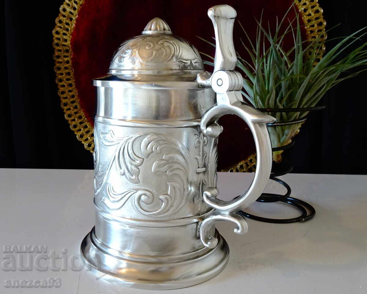 Pewter mug, ornaments, royal lily. with price 119.00 BGN | € 60.84 Pewter mug, ornaments, royal lily. with price 119.00 BGN | € 60.84