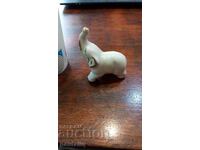 OLD PORCELAIN FIGURINE