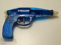 Old social toy water gun.