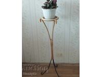 Metal flower pot stand.