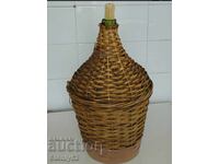 Old woven carboy, blown thick glass, 10 liters.