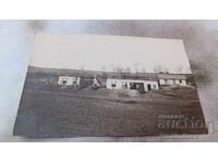 Photo Ruse Three men in front of buildings