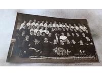 Photo Schoolgirls with their teacher