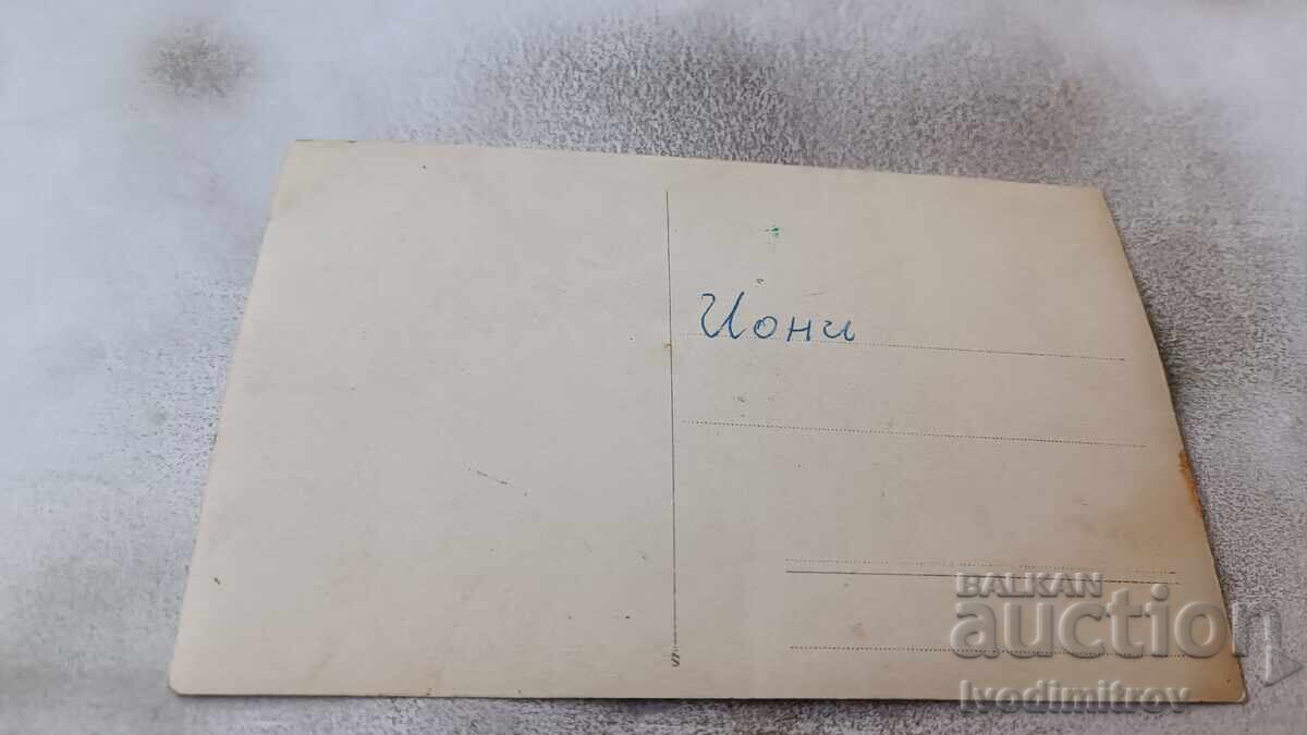 Photo Young girl sitting on a chair with price 2.35 BGN | € 1.20 Photo Young girl sitting on a chair with price 2.35 BGN | € 1.20