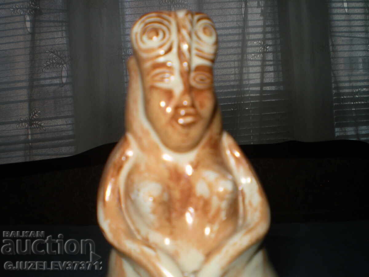 Folk art ceramic pitcher with a woman's face Folk art ceramic pitcher with a woman's face