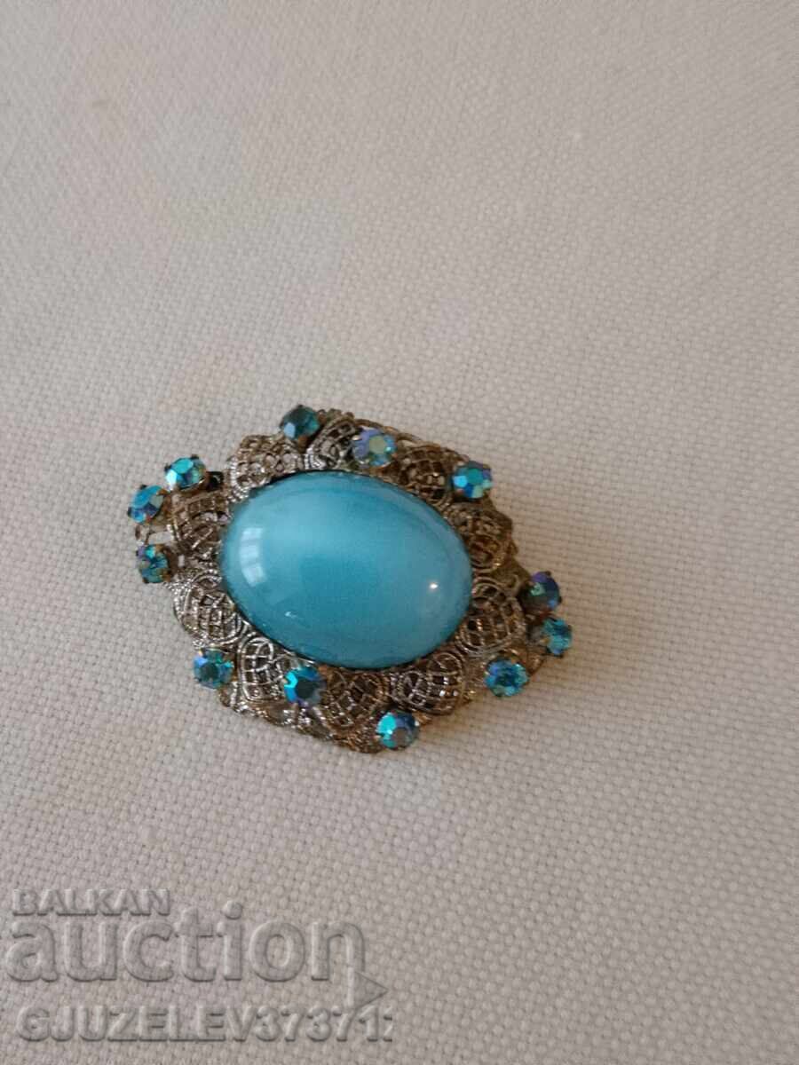 Delivery of Old Women's Brooch with blue zircons and filigree
