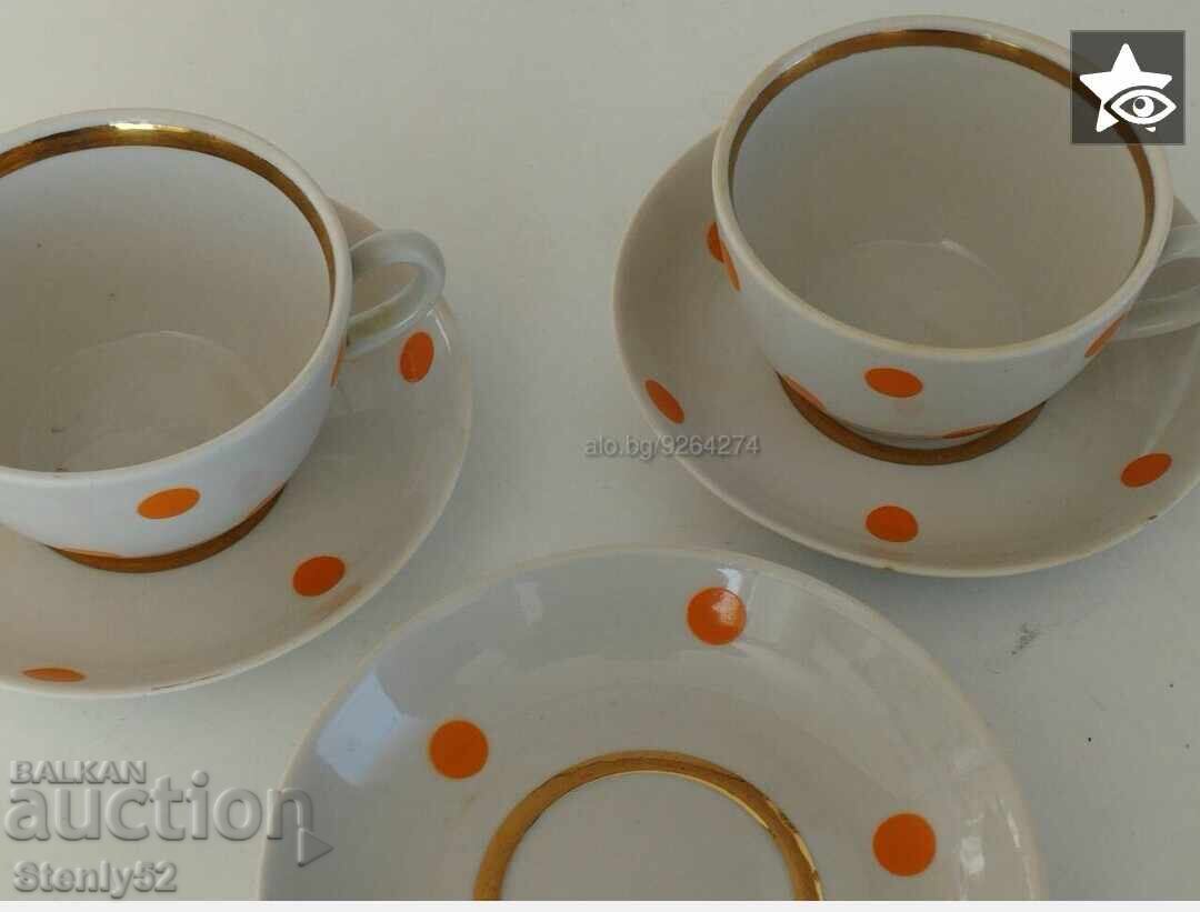 Auction Russian Sotsa porcelain 2 cups + 4 plates with gilded edges. Auction Russian Sotsa porcelain 2 cups + 4 plates with gilded edges.
