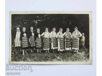 Old photo of women in folk costume