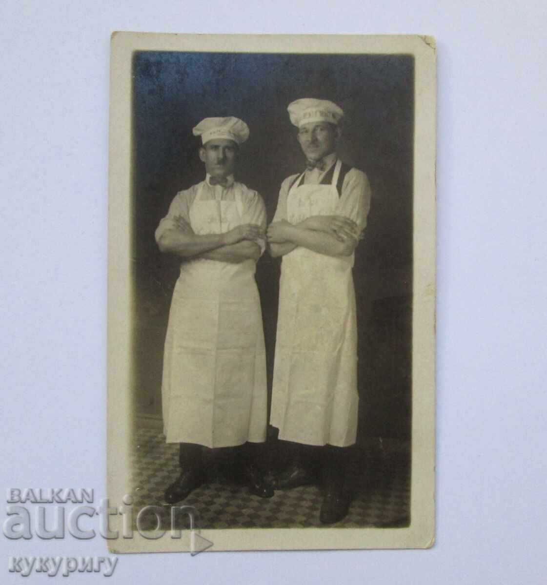 Old photo of two chef cooks Old photo of two chef cooks
