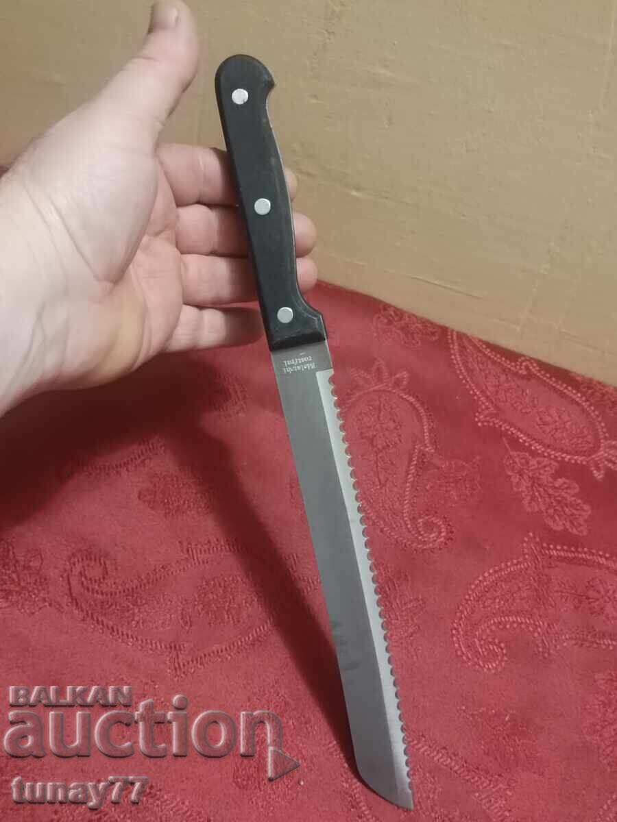 Solid kitchen knife with markings