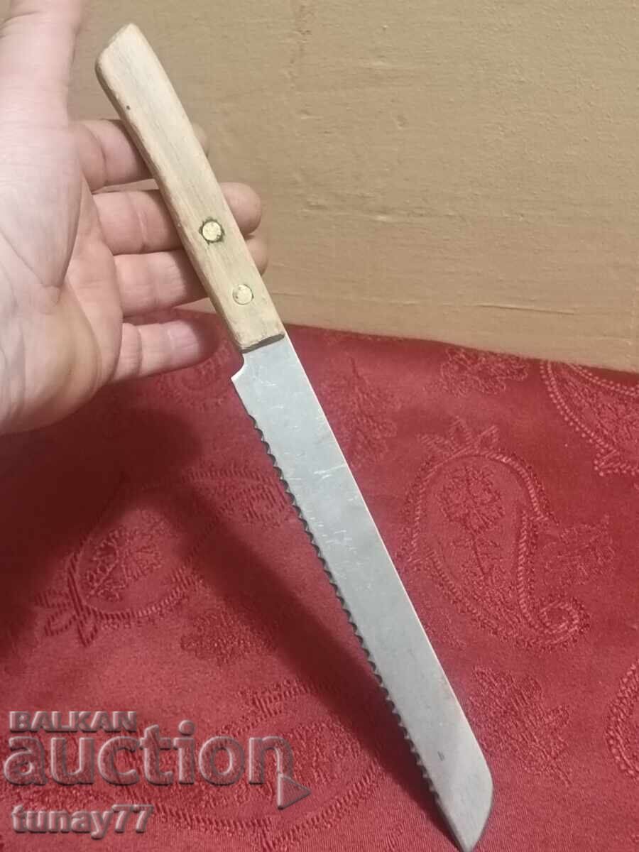 Delivery of Solid kitchen knife with markings, wooden handle