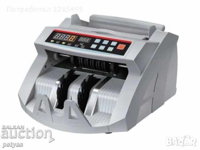 Machine for counting banknotes of different currencies Machine for counting banknotes of different currencies