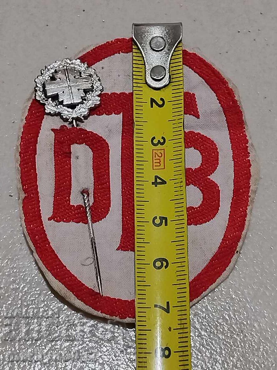 Enameled German badge with embroidered emblem 1930 with price 125.00 BGN | € 63.91 Enameled German badge with embroidered emblem 1930 with price 125.00 BGN | € 63.91