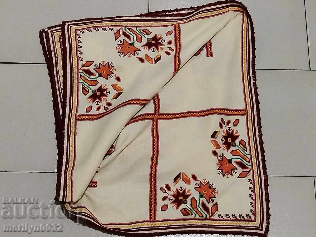 Delivery of Old hand-embroidered tablecloth, plaid