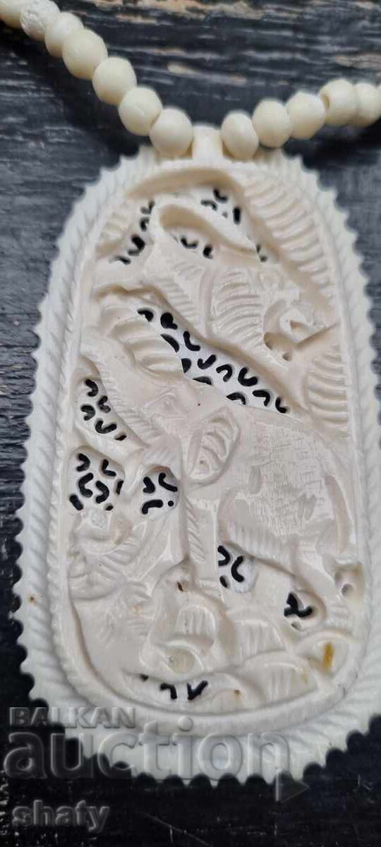Auction Ivory necklace. Auction Ivory necklace.