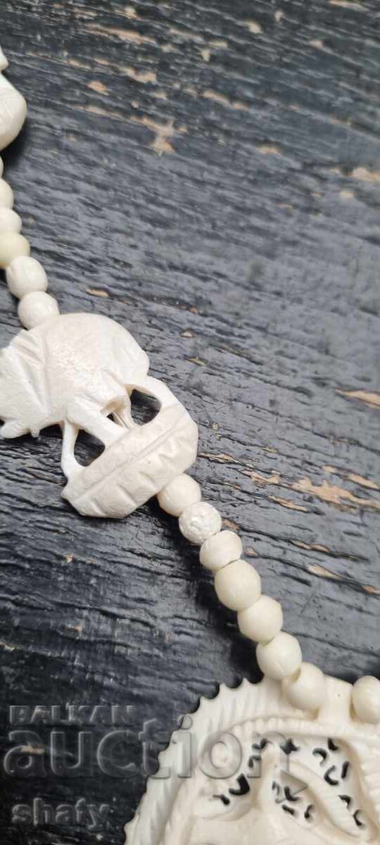 Delivery of Ivory necklace. Delivery of Ivory necklace.