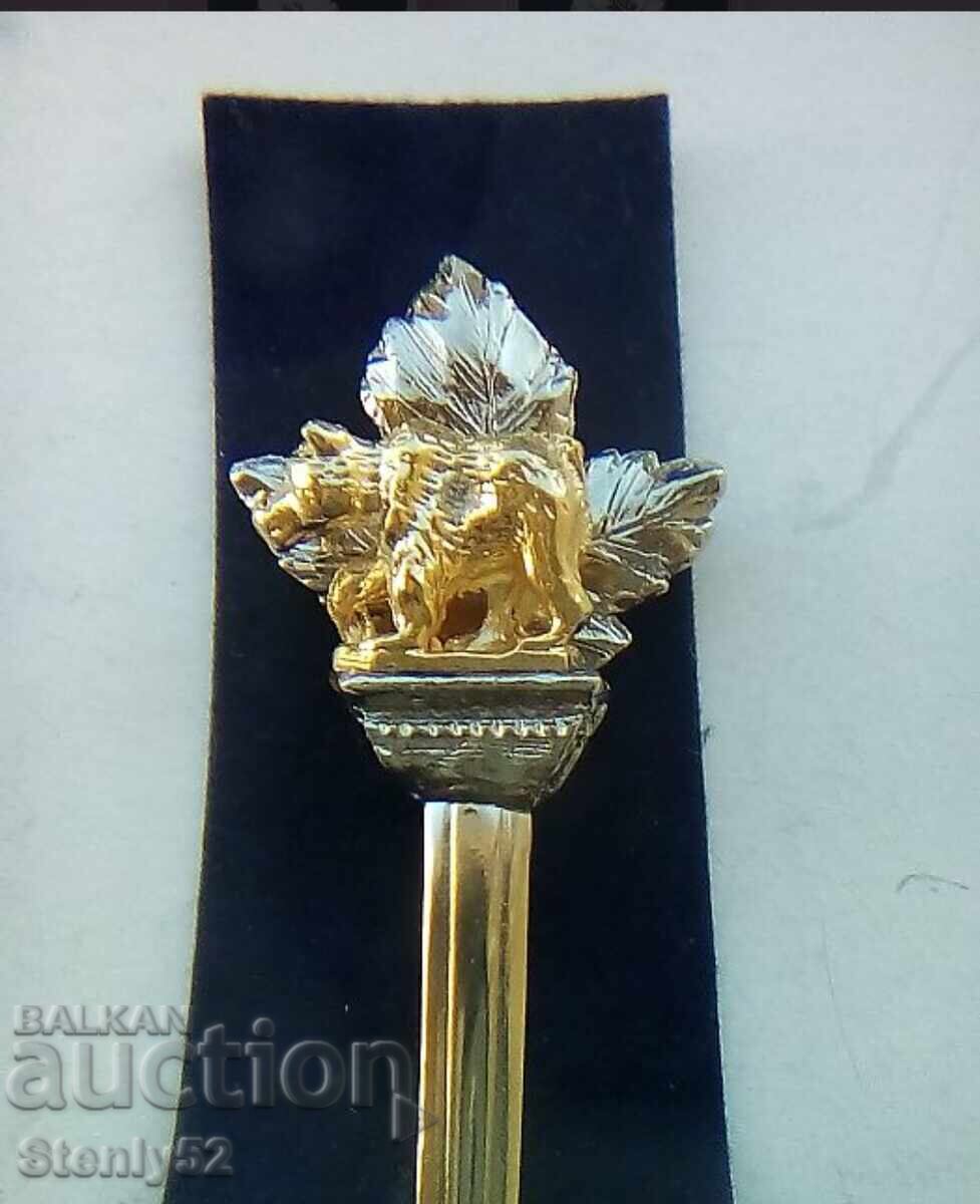 Auction  2 pcs. tea and coffee spoons with a bear and a dog