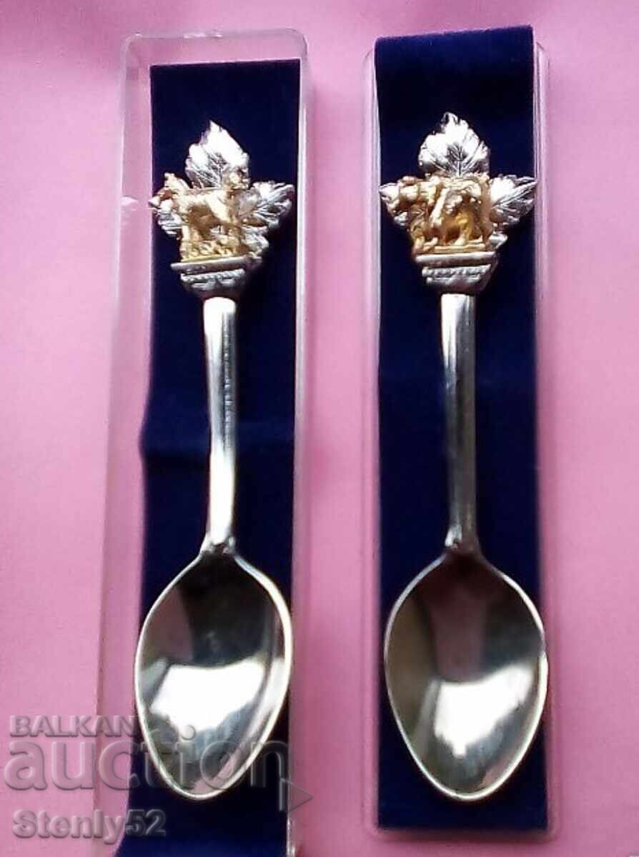 2 pcs. tea and coffee spoons with a bear and a dog