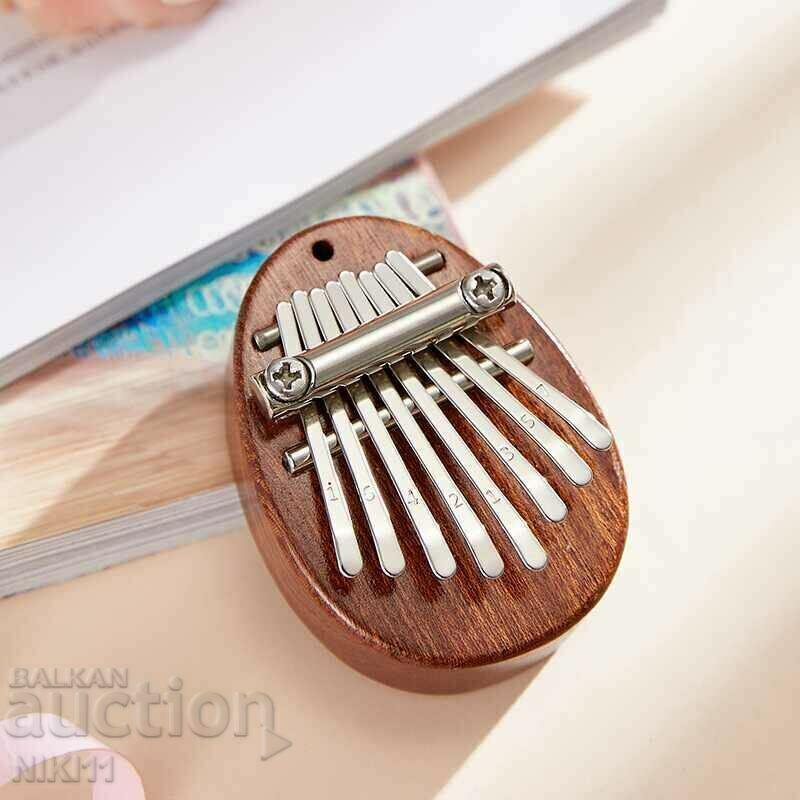 Small musical instrument Kalimba, pocket Kalimba with price 33.00 BGN | € 16.87 Small musical instrument Kalimba, pocket Kalimba with price 33.00 BGN | € 16.87