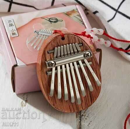 Delivery of Small musical instrument Kalimba, pocket Kalimba Delivery of Small musical instrument Kalimba, pocket Kalimba