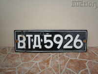 Pair of old enameled car license plates from the 60s