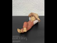 Porcelain figurine of a reclining child - Goebel. №6384