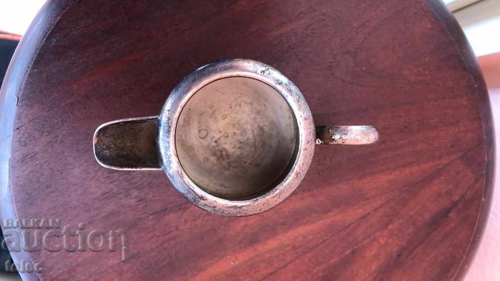 Auction  Old English jug with silver coating