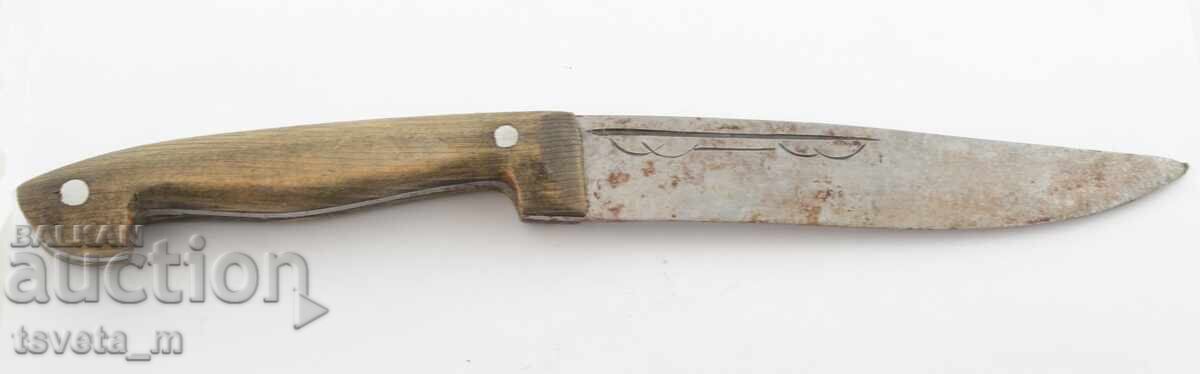 Antique knife with a wooden handle Antique knife with a wooden handle