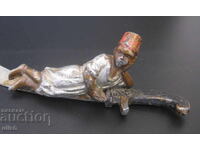 Antique figurine Muslim child tin tsam sword