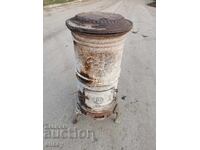 Antique cast iron stove with ornaments