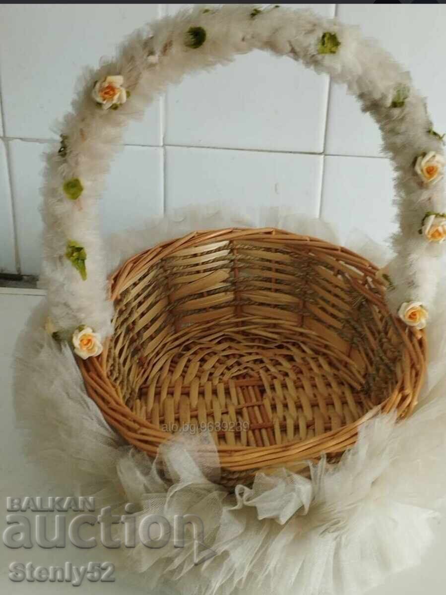 A woven wooden basket from a wedding.