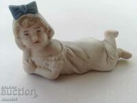 Small porcelain figurine